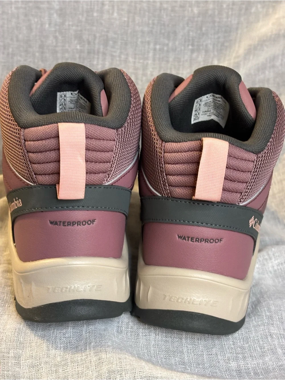 Columbia Women's Dusty Burgundy/Tan Trail Mid-Top Hiking Shoes weatherproof.